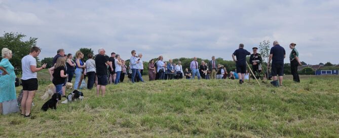 Local residents gather at Coppice Farm for the planting of the orchard